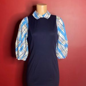 Casual navy blue dress with multi-color sleeves.